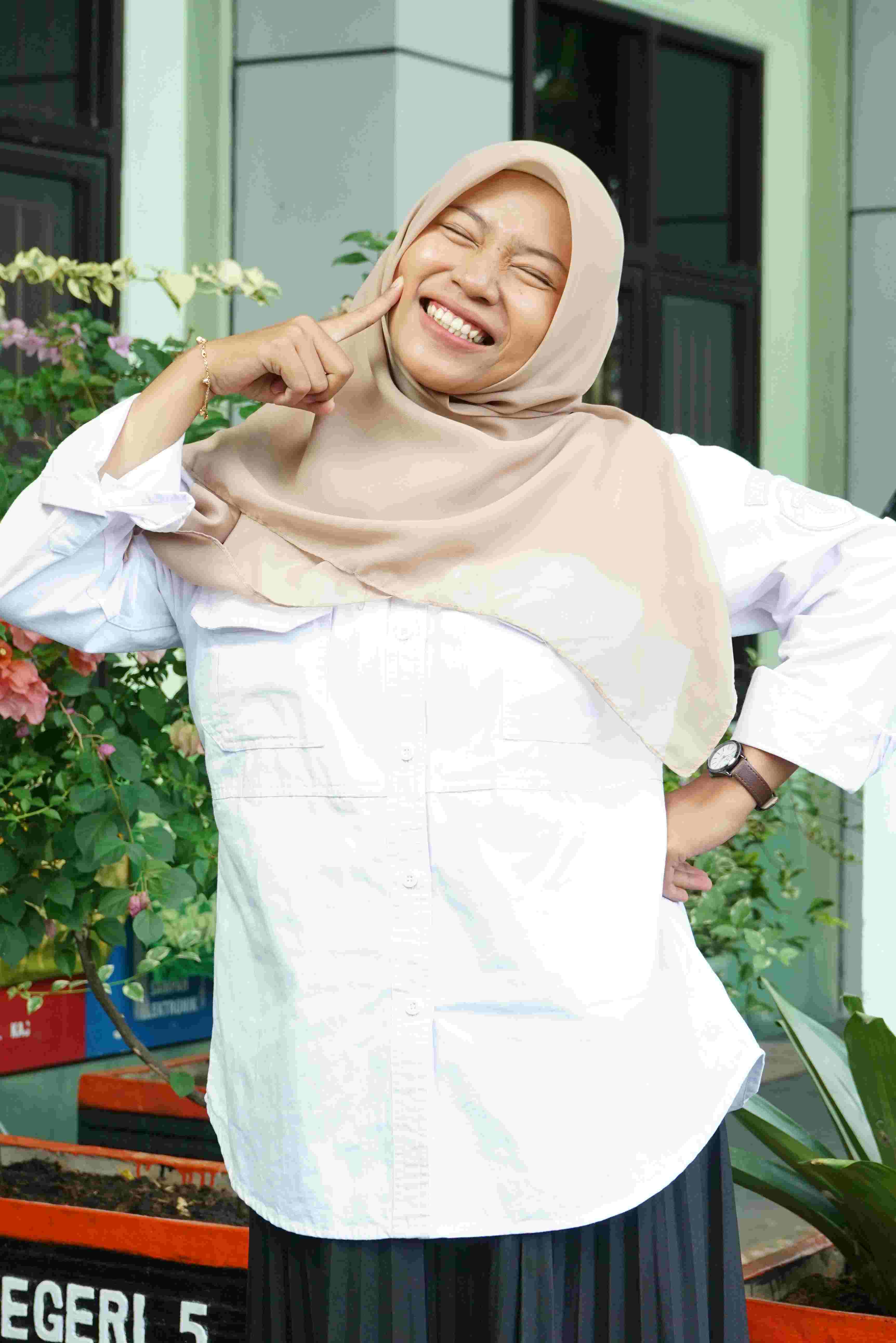 Dewi Sinta, S.Pd.